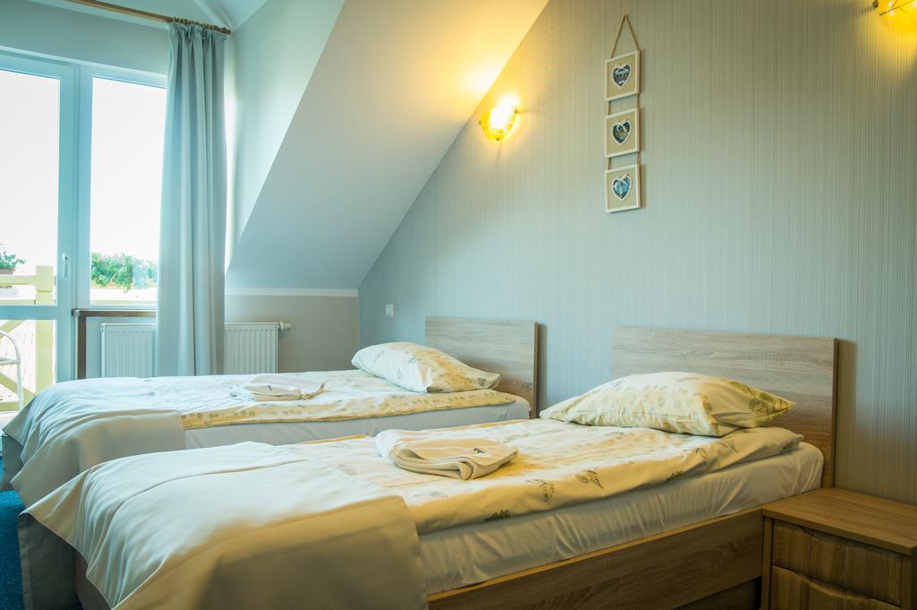 Sloneczny Port Bed and Breakfast Mikołajki Rum bild